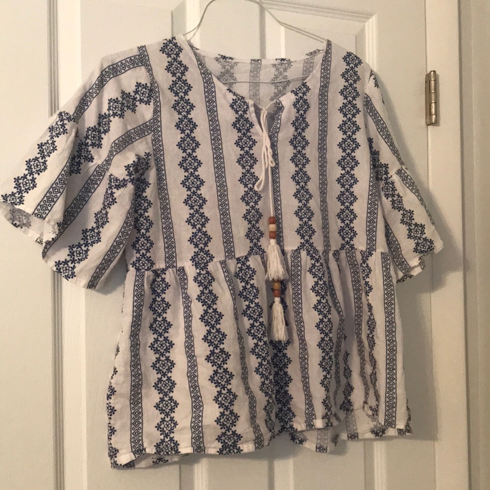 blue and white peasant top with tassels